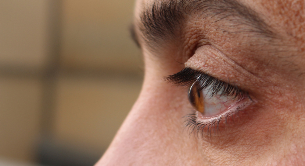 Side profile close-up of a human eye during a vision and eye health examination – Ophthalmologist Costa Mesa